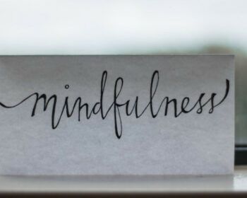 A note in front of a window that says mindfulness